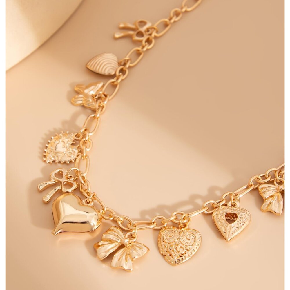 Sophisticated Gold Keychain With Charming Heart A… - image 3